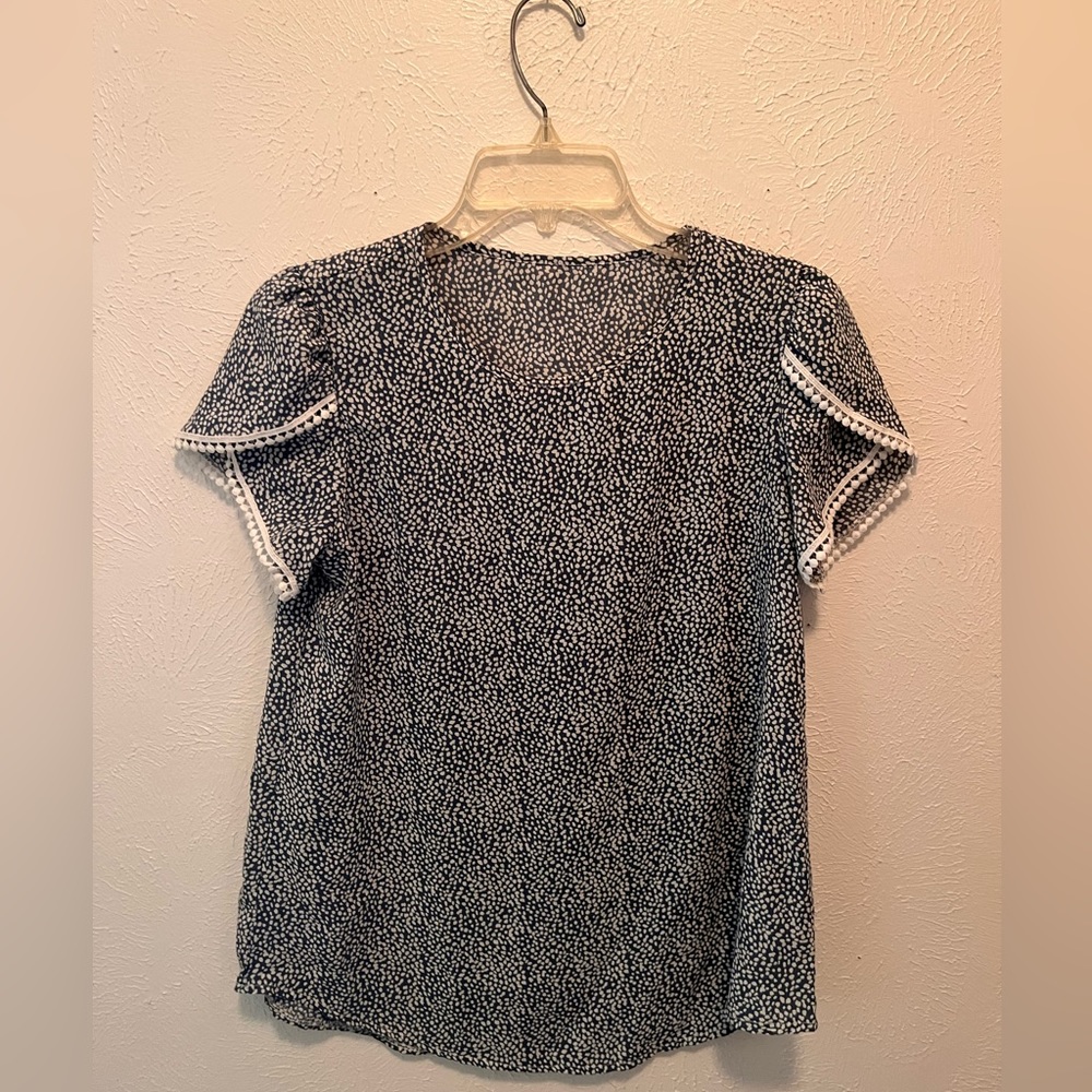 Light blue blouse with white dots all over. SHEIN. Size small.